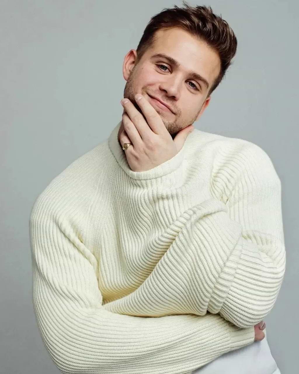 Leo Woodall wearing Percival Ecru Fisherman Jumper on One Day film set