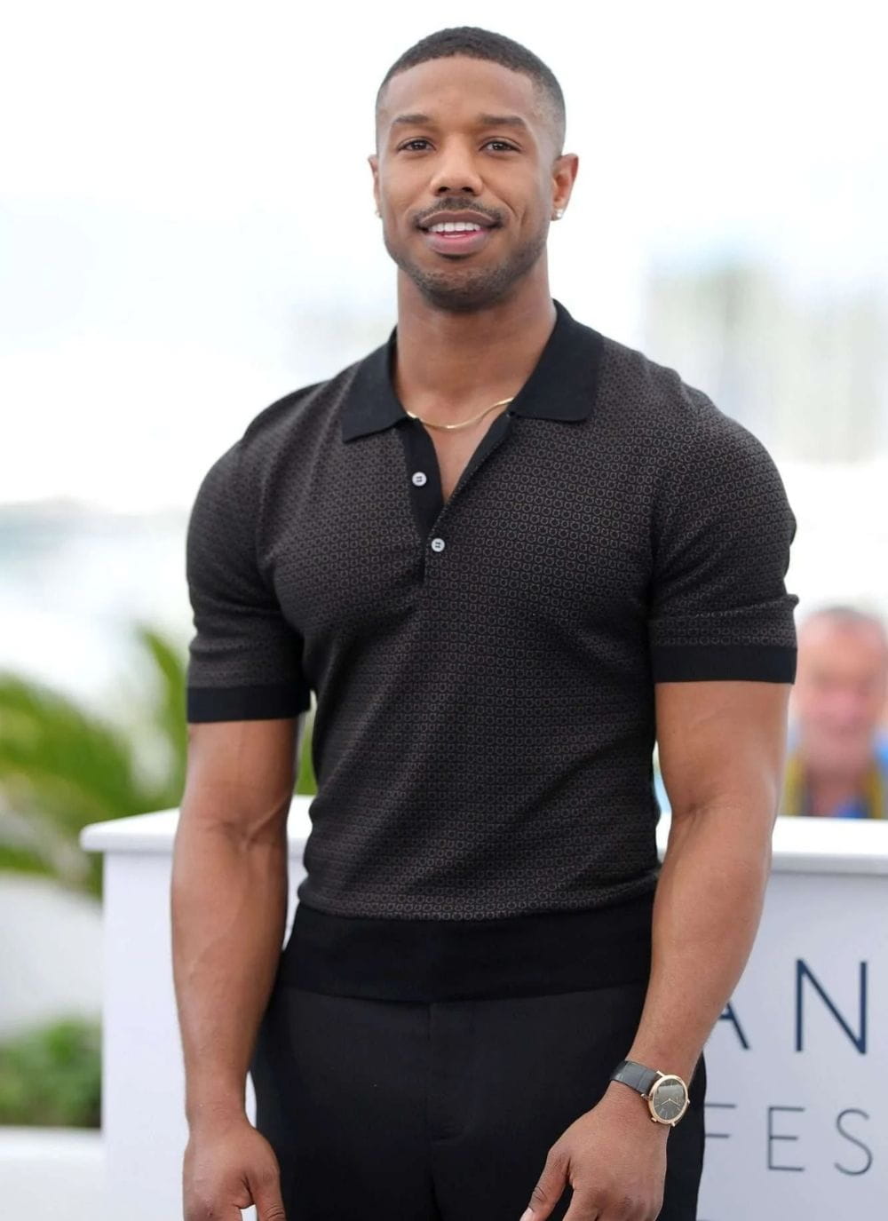 Michael B. Jordan wearing Percival Menswear textured knit polo shirt