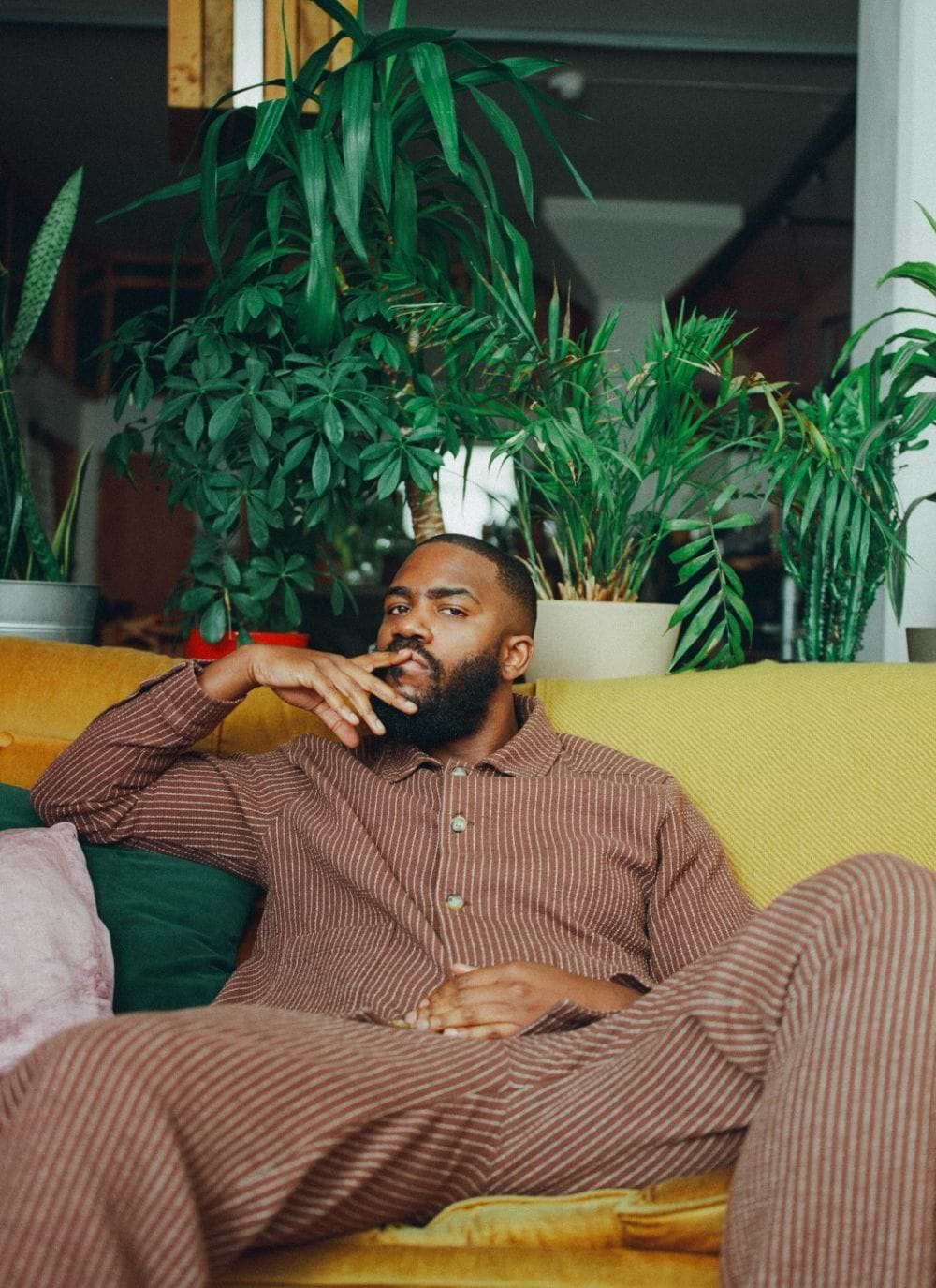 Mo Gilligan wearing Percival Espresso Minnesota Overcoat and Brown Sorrento overshirt and trousers