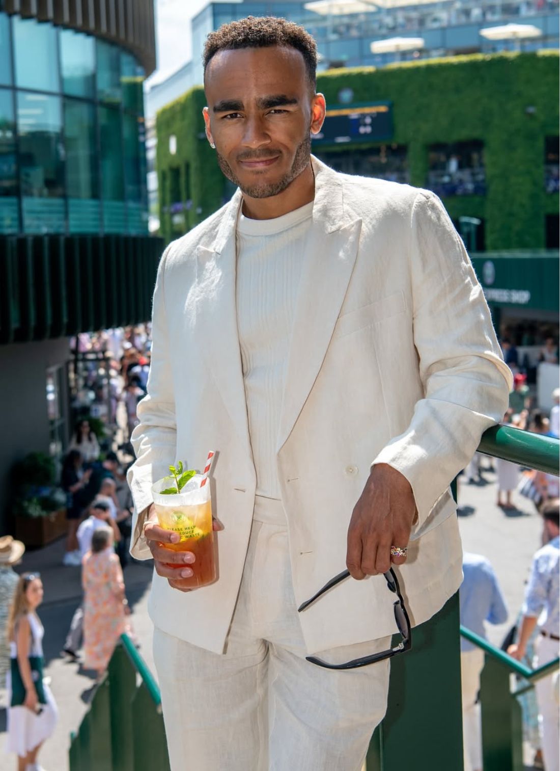 Munya Chawawa wearing Percival Cream Double Breasted Linen Suit