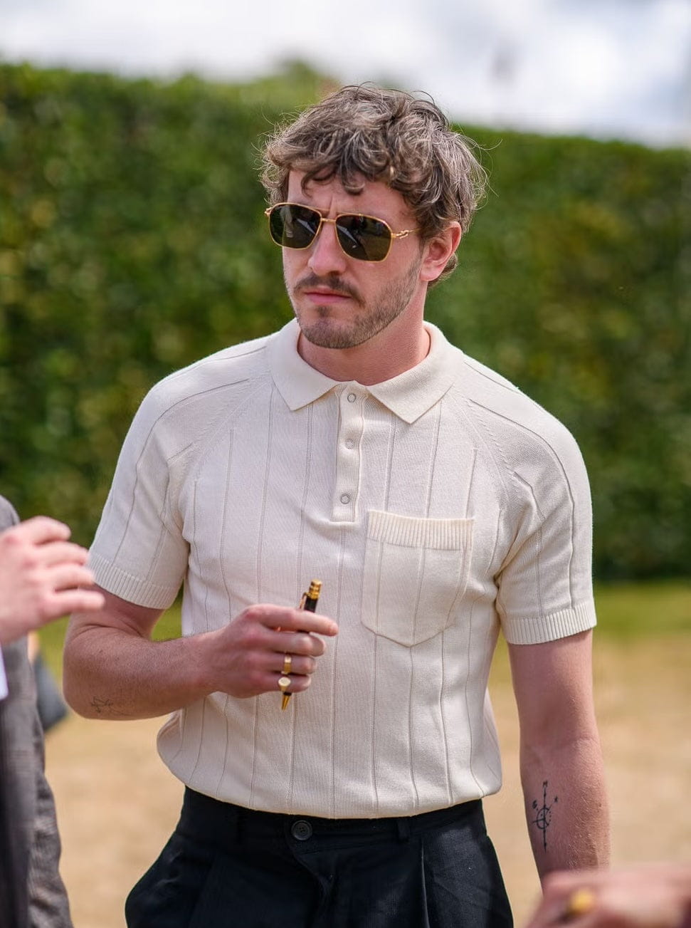 Paul Mescal wearing Percival Menswear signature cream knitted polo in London