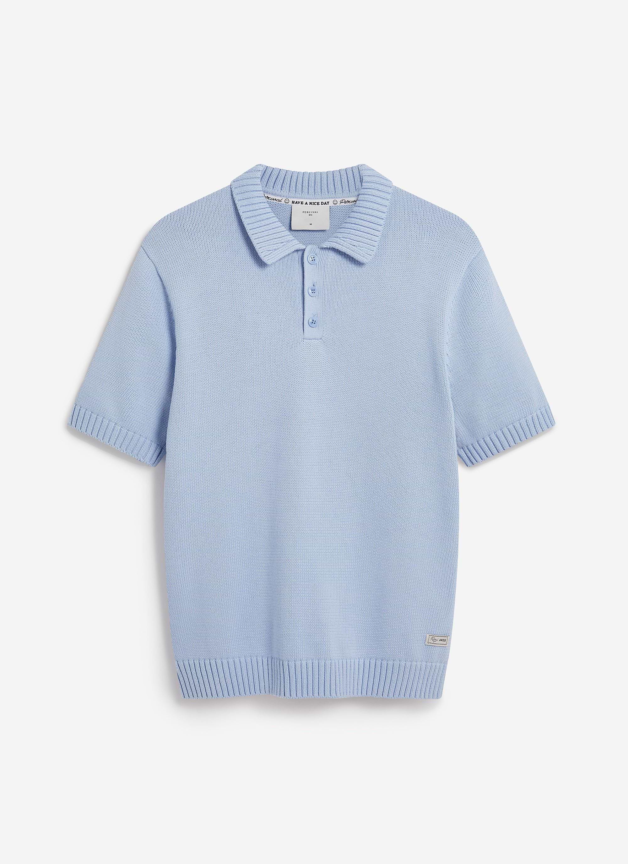 The Percival Verso Short Sleeve Knitted Shirt in heather blue cotton, shown flat against a white background.