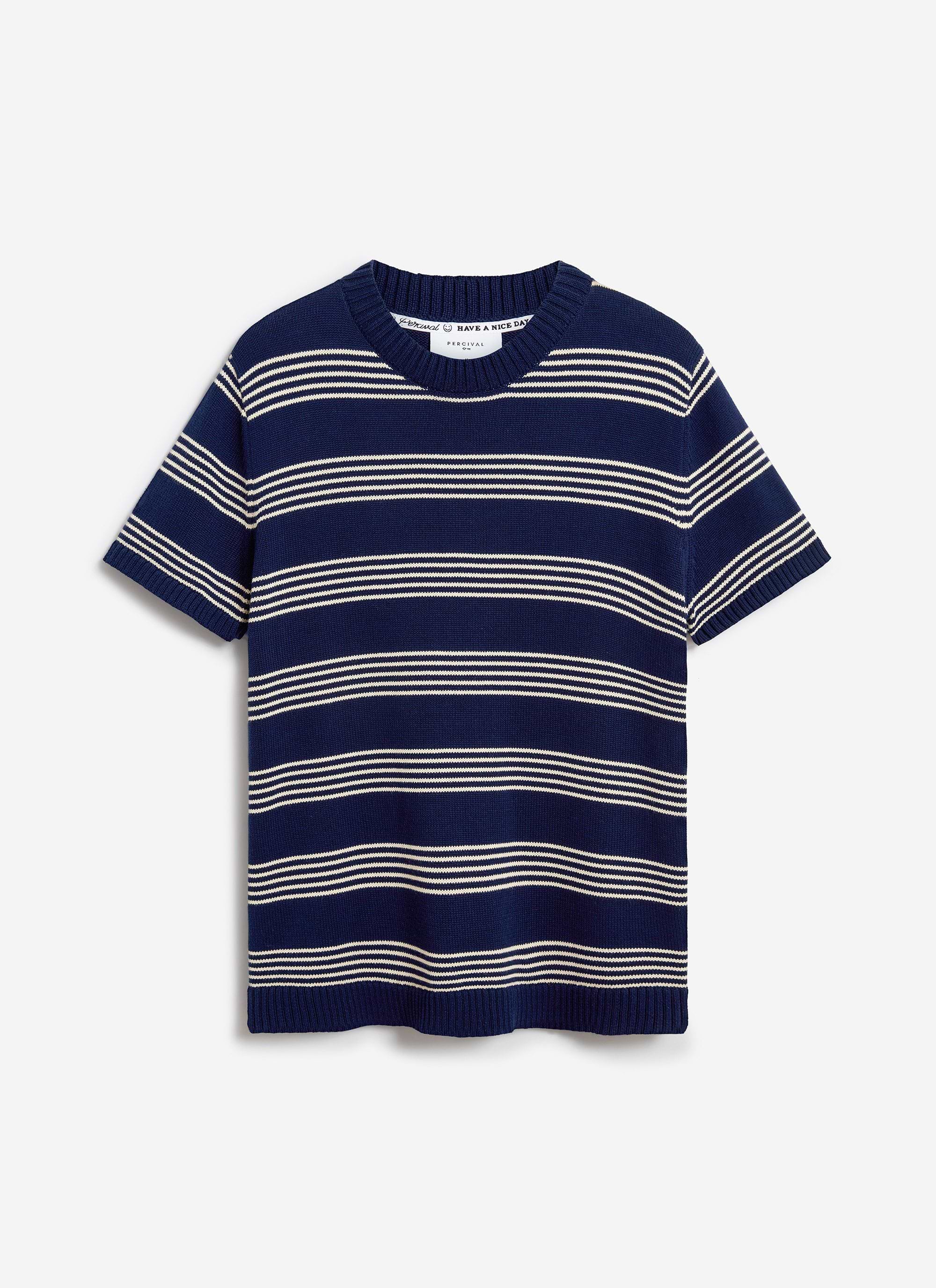 The Percival Fiction Striped Knitted T-shirt in navy cotton, with cream horizontal stripes, laid flat on a white background.
