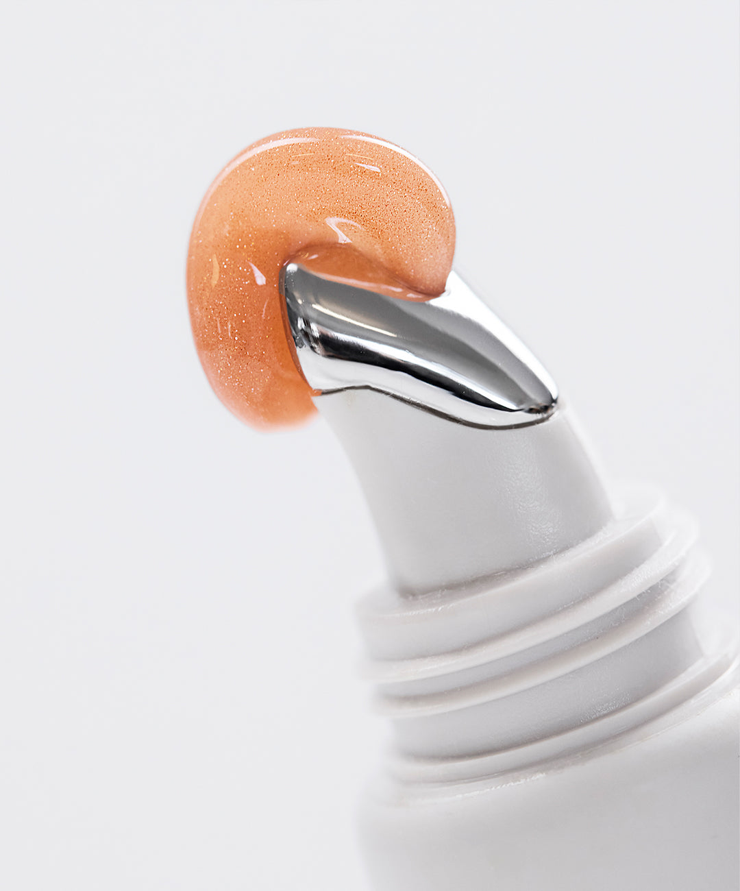 | desc: Lip Gloss in shade Topaz