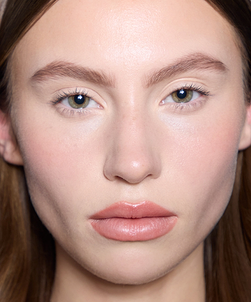 | desc: | text: light Cleo wears Brow Pomade in Chestnut