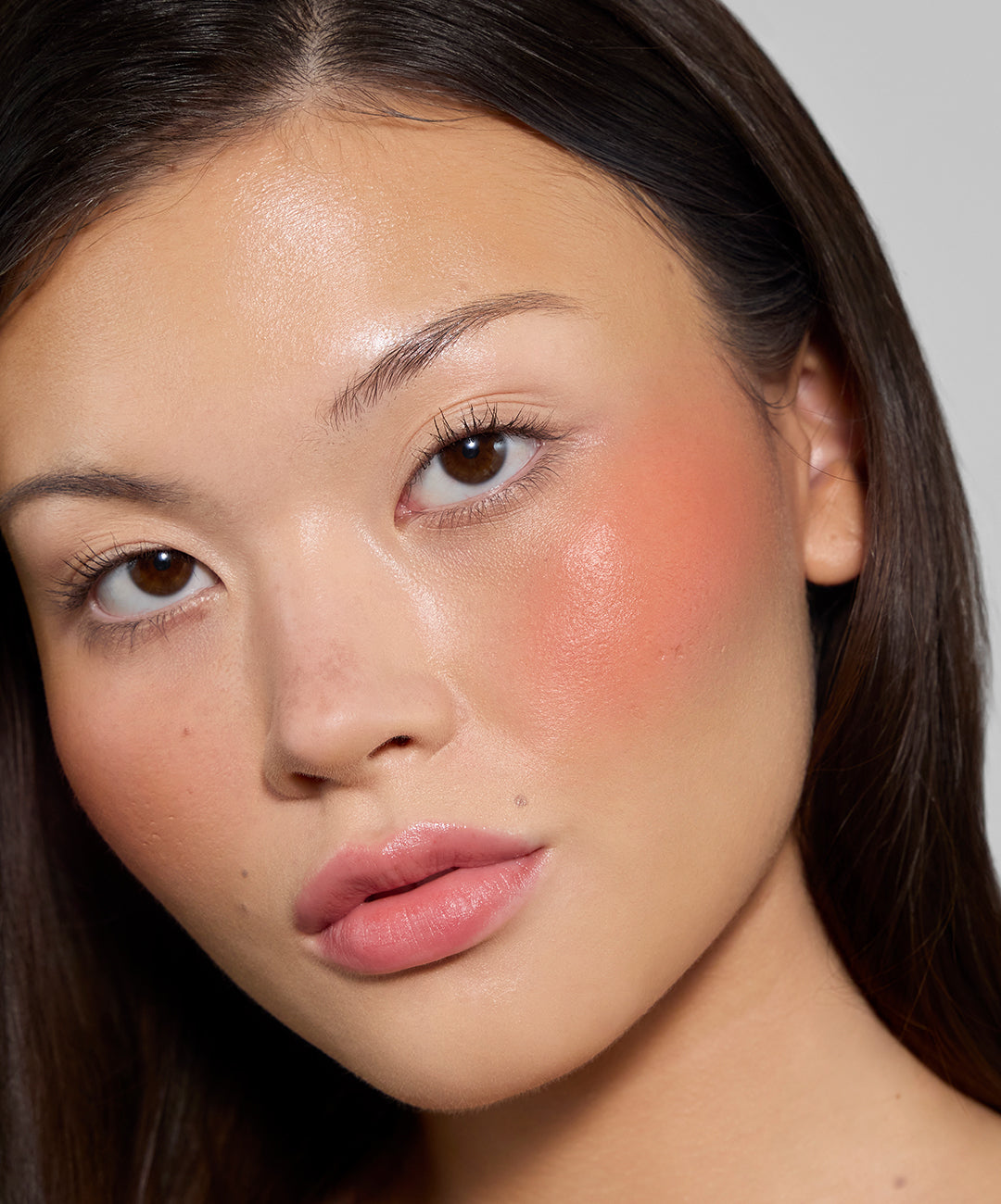 | desc: Tuti wears shade Papaya