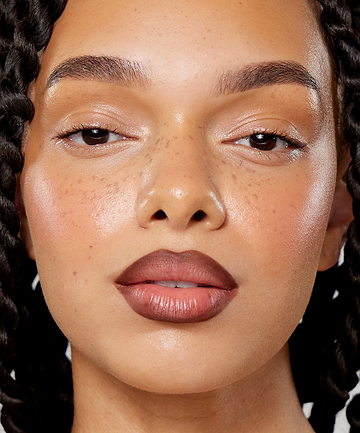 | desc: | text: light Gabbi wears Lip Sculpt in Sepia