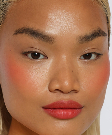 | desc: Model wears shade Papaya