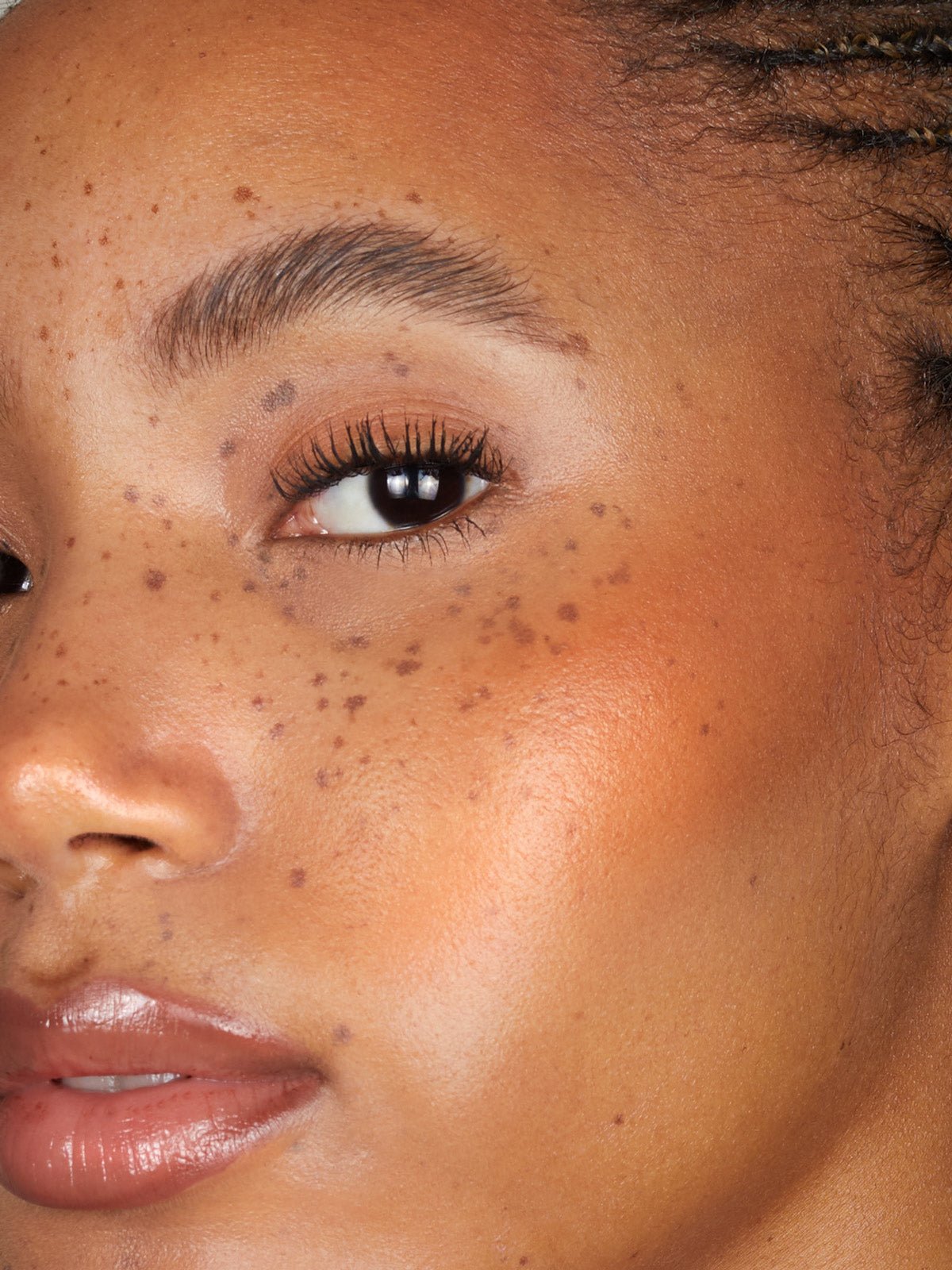 REFY CREAM BROZNER IN SHADE TAN ON MODEL
