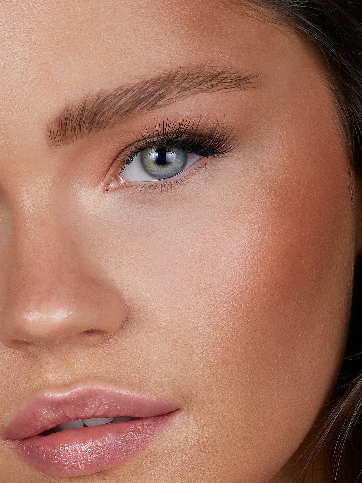 REFY CREAM BROZNER IN SHADE TAN ON MODEL