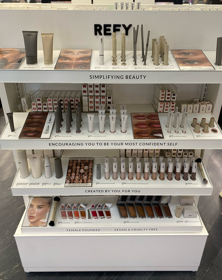 Display of REFY makeup products in a store setting