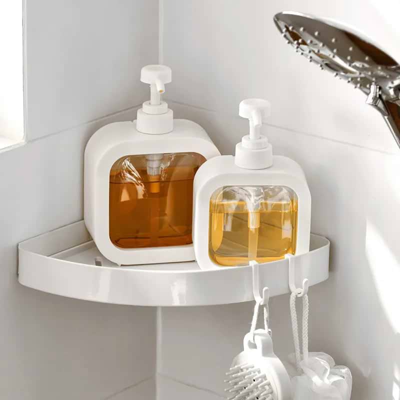 Restroom soap dispensers top