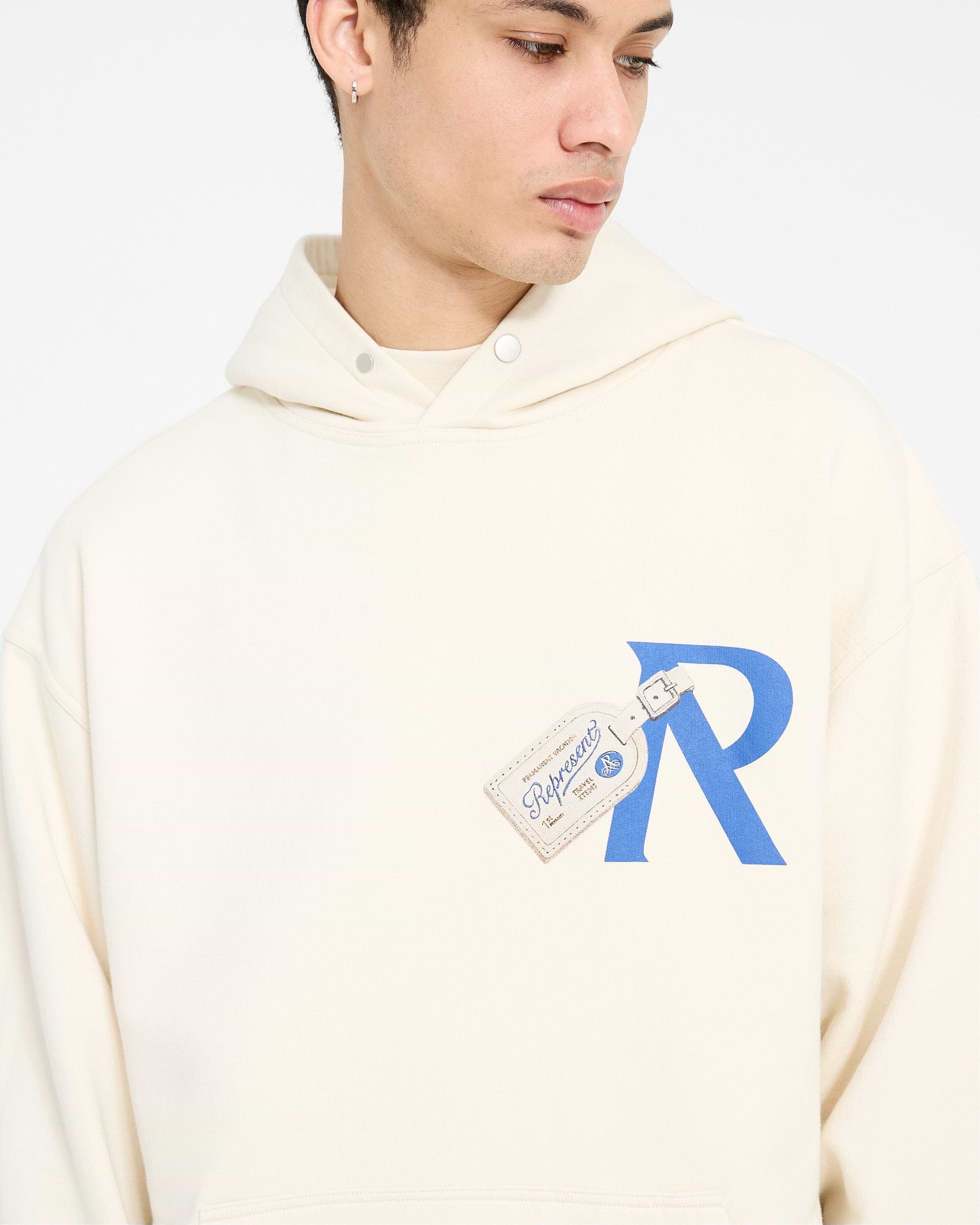 大特価!! Luggage Tag Hoodie | Antique White | REPRESENT トップス