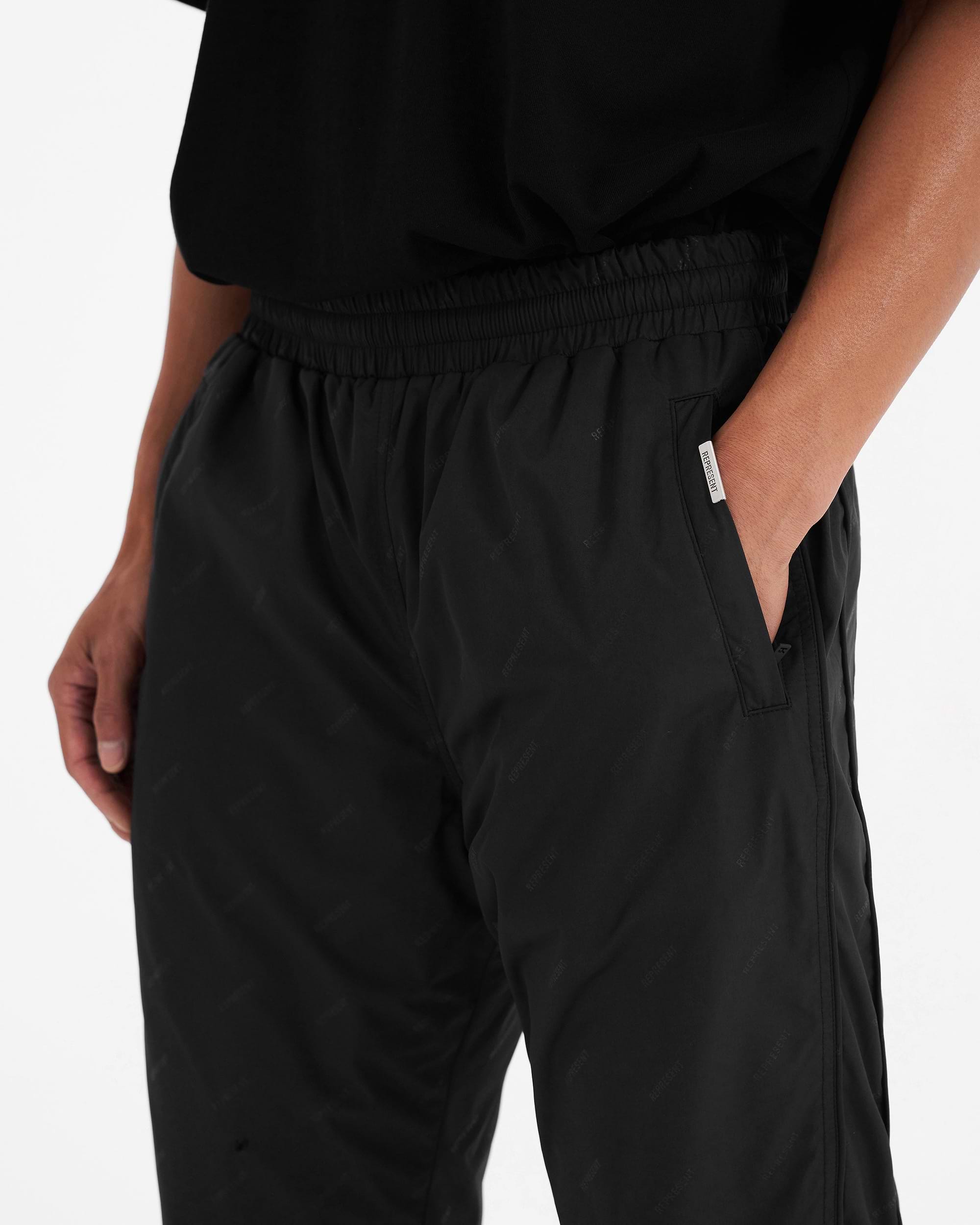 All Over Logo Trackpants | Black Pants FW22 | Represent Clo