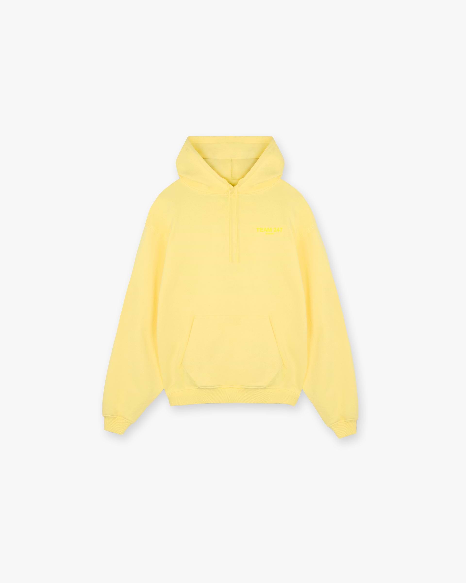Front product image of a mens yellow hoodie on a plain white background | Team 247 Oversized Hoodie in Lemon | Oversized hoodie with a relaxed fit | 247 Hoodies | Represent Clo