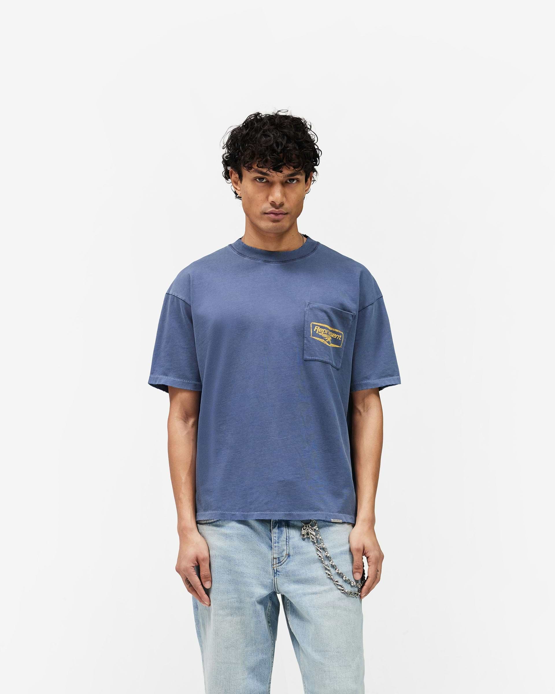 Represent Nothing Faster T-Shirt in Indigo, featuring a chest patch pocket with the Represent logo.