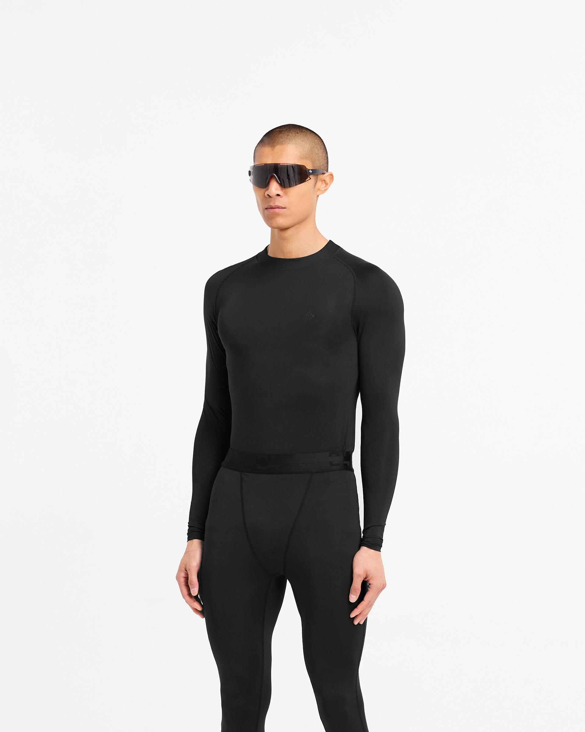 Back product image of a mens black long sleeve t-shirt on a plain white background | 247 Compound Long Sleeve T-Shirt in Black | Antibacterial long sleeves with external flatlock stitching | 247 T-Shirts | Represent Clo