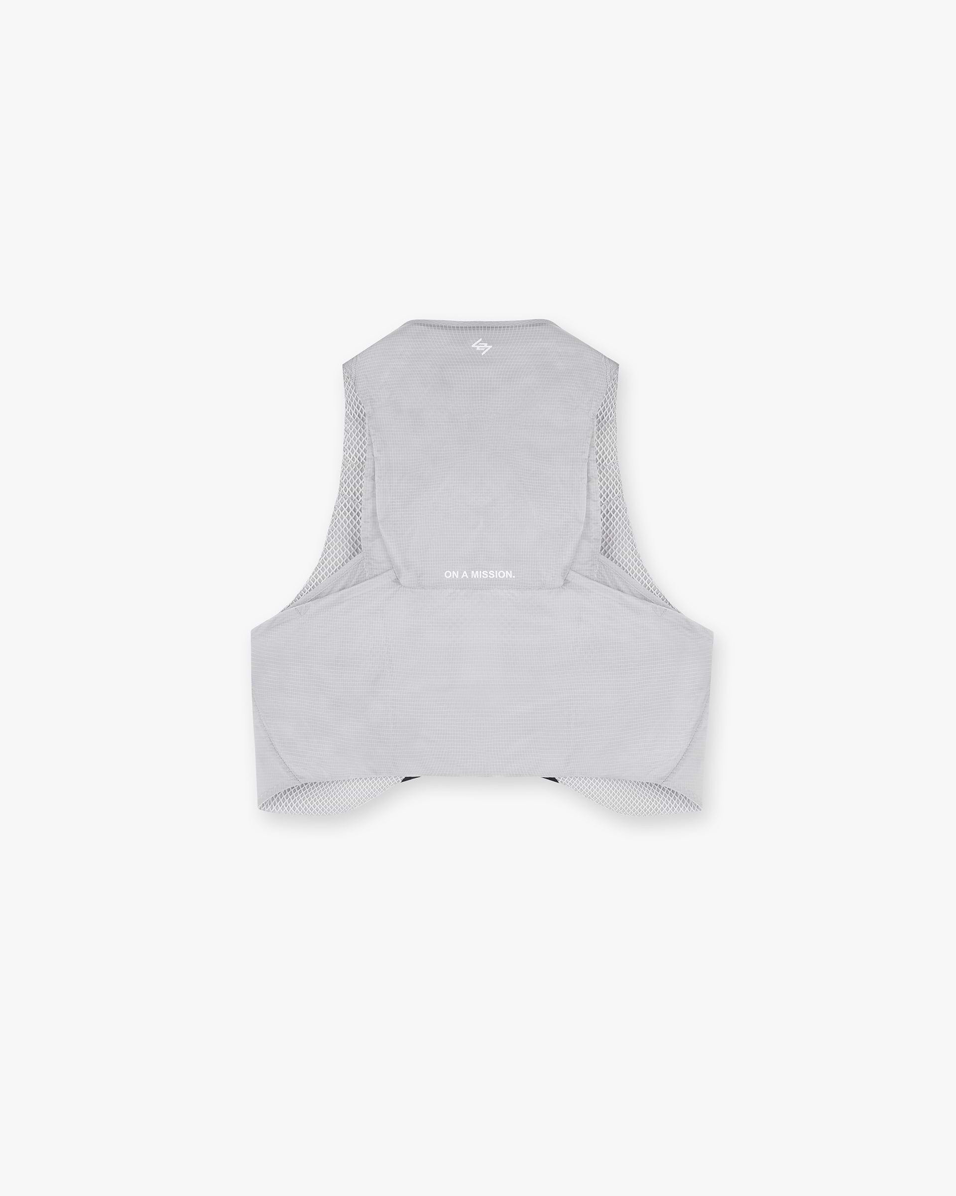Back product image of a mens chest rig in moonstone on a plain white background | Team 247 Chest Rig in Moonstone | Nylon ripstop chest rig with magnetic buckles and stretch power mesh pockets | 247 Accessories | Represent Clo