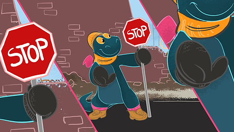 Toestee acting as a crossing guard but with nice warm hands because of Heat Holders® gloves!