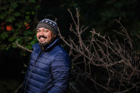 Man wearing Heat Holders® Puffer jacket and thermal hat.