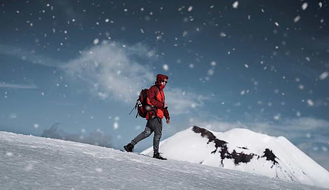 A person hiking in the snow.