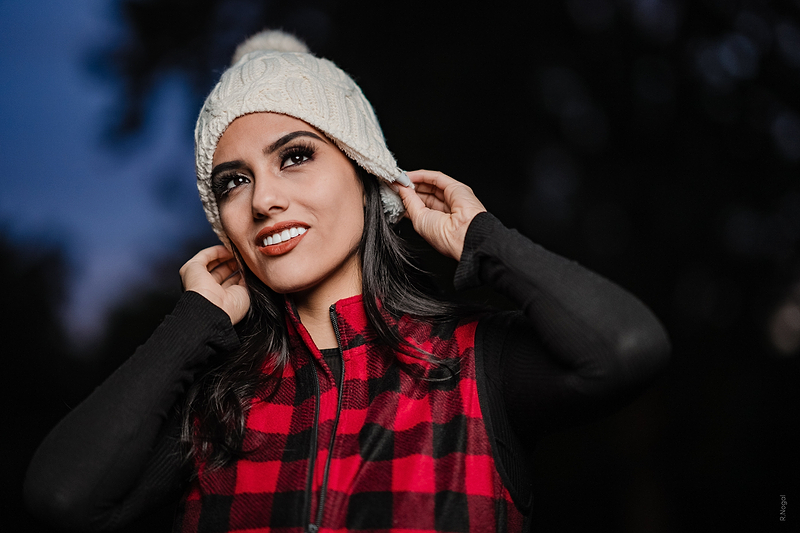 Woman wearing Heat Holders ORIGINAL® Zip Vest with a Heat Holders® thermal hat.