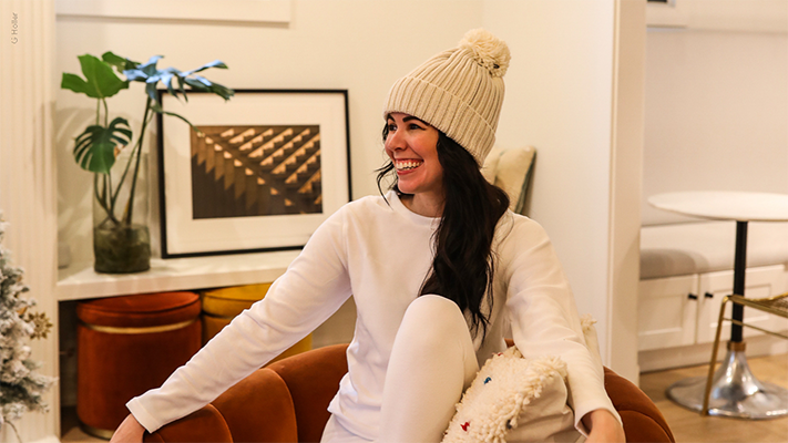 Woman wearing Heat Holders® thermal base layers in white