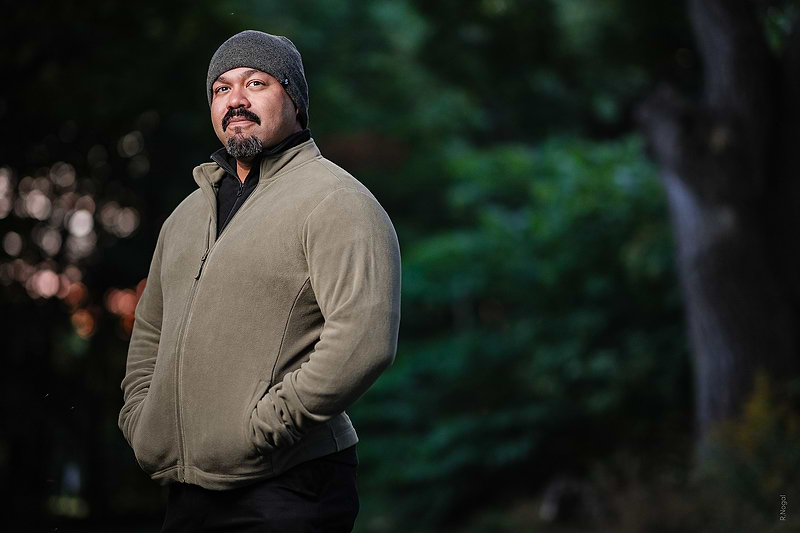 Man wears Heat Holders® thermal hat, and ORIGINAL Zip Jacket