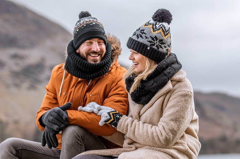 Couple wearing Heat Holders accessories