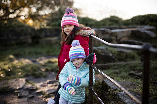 Kids wearing Heat Holders® hats and gloves