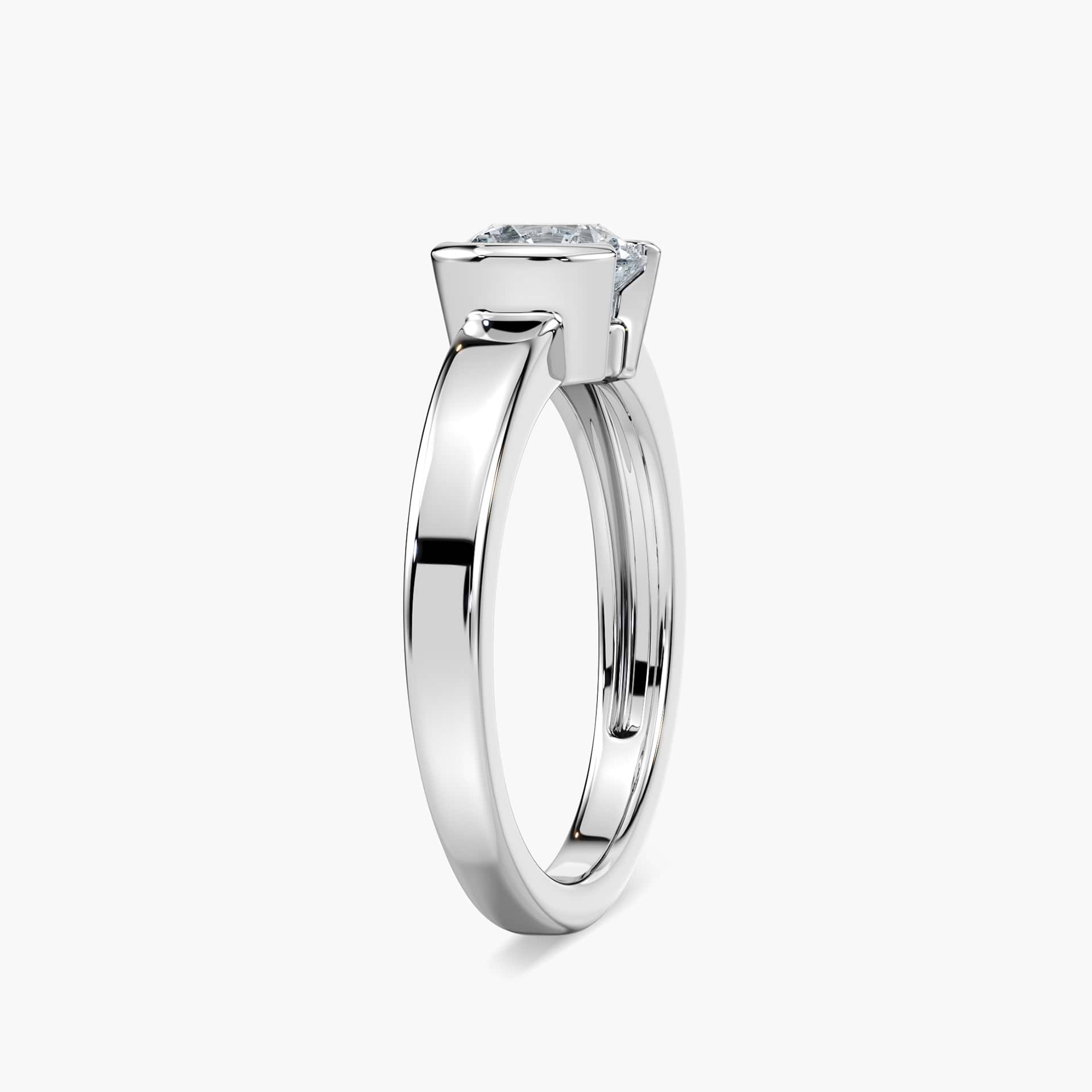 Shown with 1ct Round Cut Lab Grown Diamond in 14k White Gold|Minimalistic modern solitaire engagement ring with 1ct round cut lab grown diamond in 14k white gold worn on hand