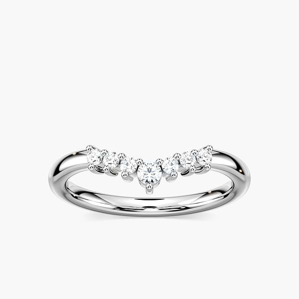 The Cordelia Wedding Band has a .21ctw half halo of round cut recycled diamonds that get larger in size as they meet in the middle of the recycled 14K white gold band | Cordelia wedding band recycled diamonds 14K white gold