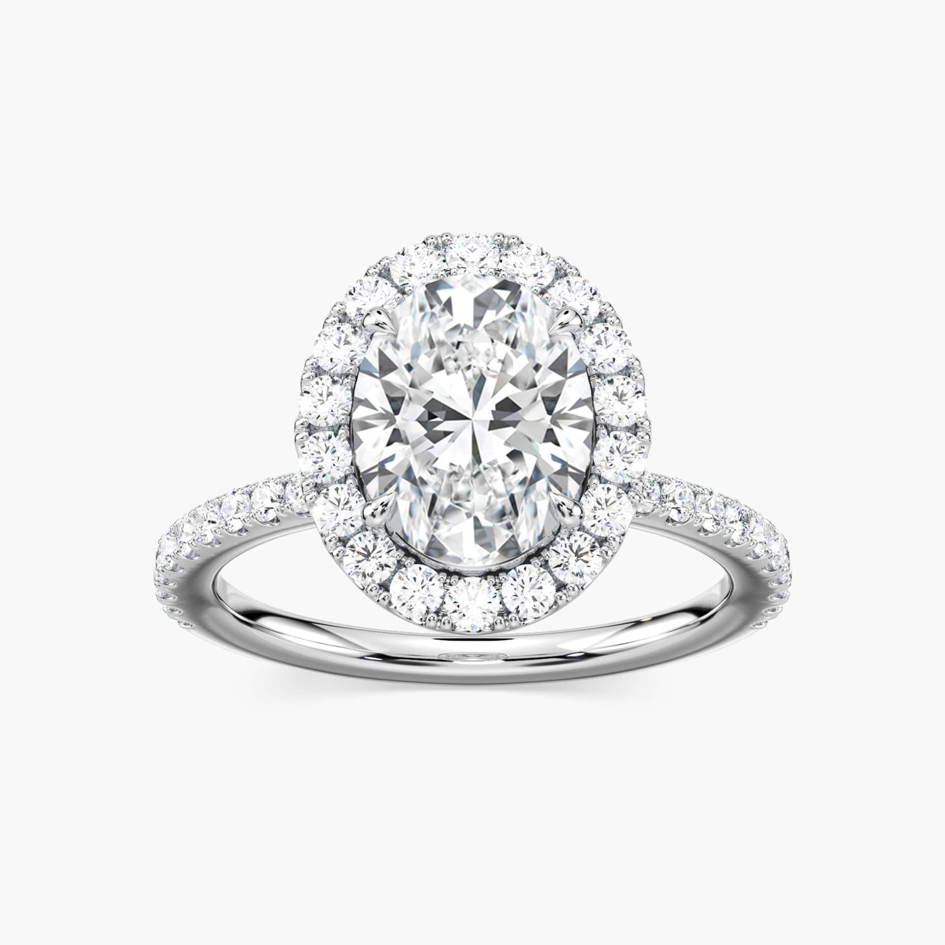 Shown with 1ct Oval Cut Lab Grown Diamond in Platinum|Dream diamond halo engagement ring with diamond accents and a 1ct oval cut lab grown diamond in platinum