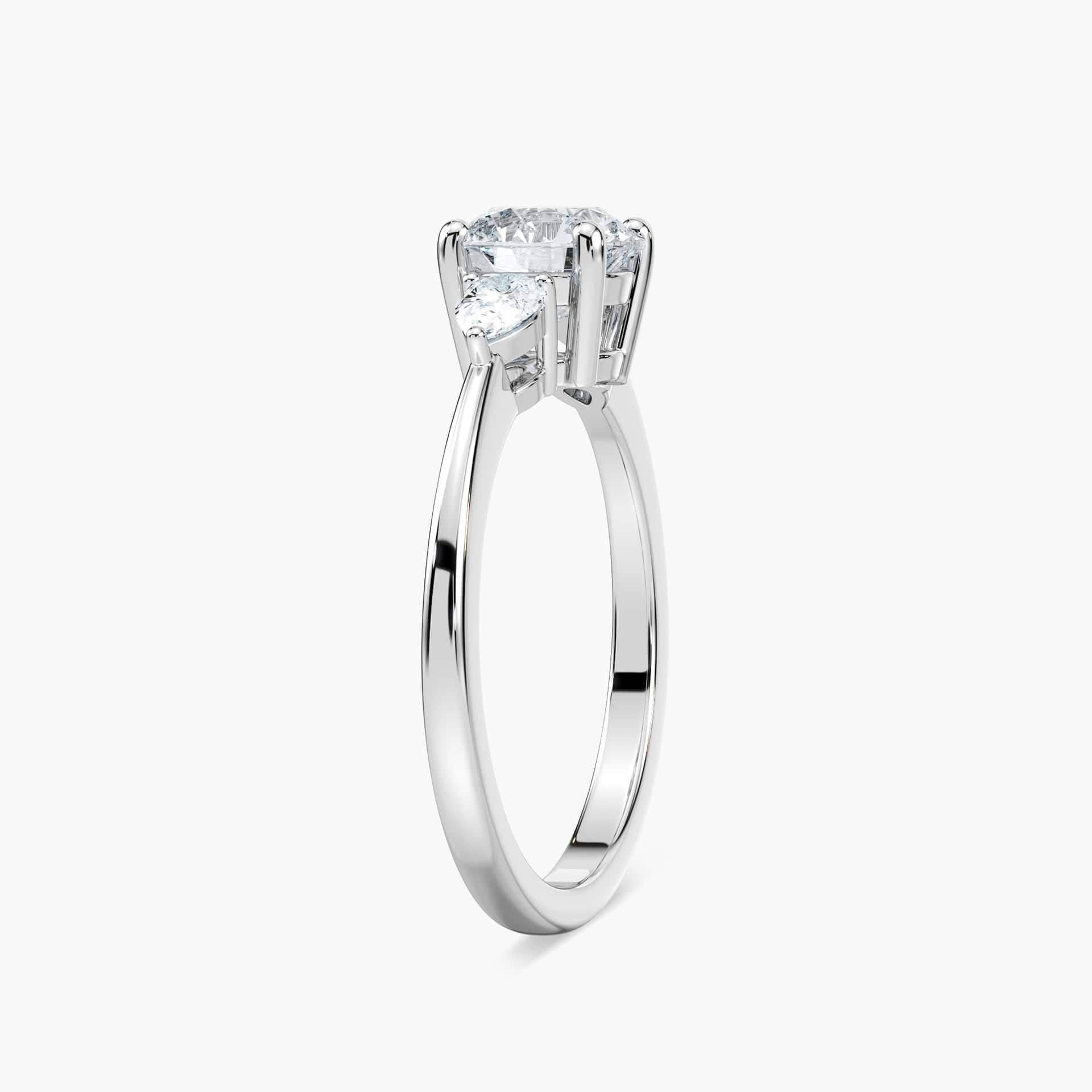 Shown with 2ct Lab Grown Champagne Pink Sapphire in 14k White Gold|Beautiful lab grown champagne pink sapphire engagement ring with pear cut side stones in 14k white gold