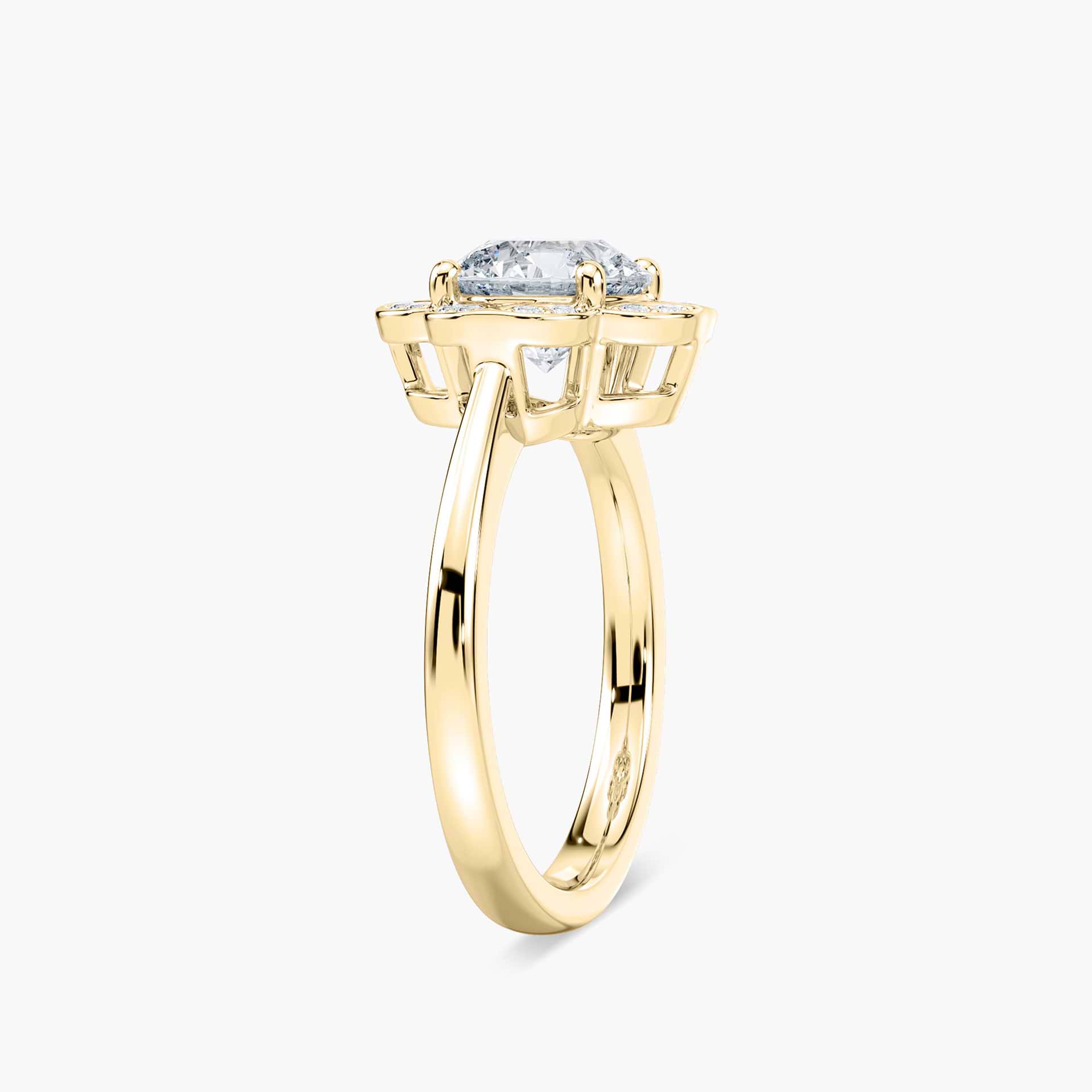 Shown with 1ct round cut lab grown diamond in 14k white gold|Nature inspired vintage style engagement ring with floral petal halo design around a 1ct round cut lab diamond in 14k white gold