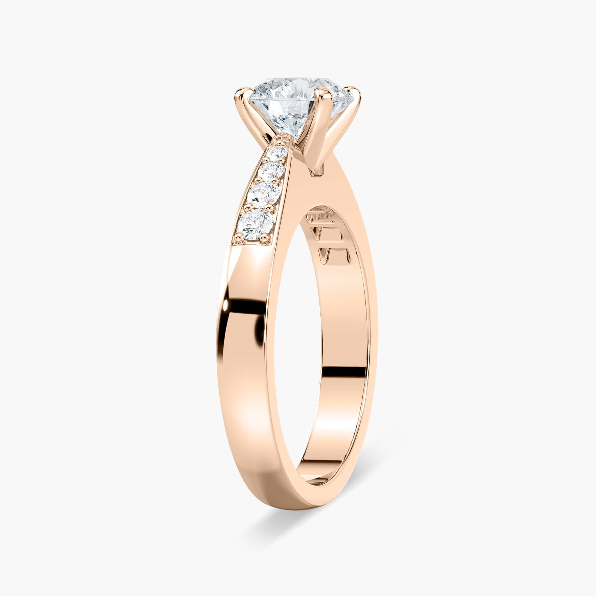 Shown with 1ct Round Cut Lab Grown Diamond in 14k White Gold|Modern style solitaire engagement ring with a 1ct round cut lab grown diamond and channel set accenting diamonds in 14k white gold