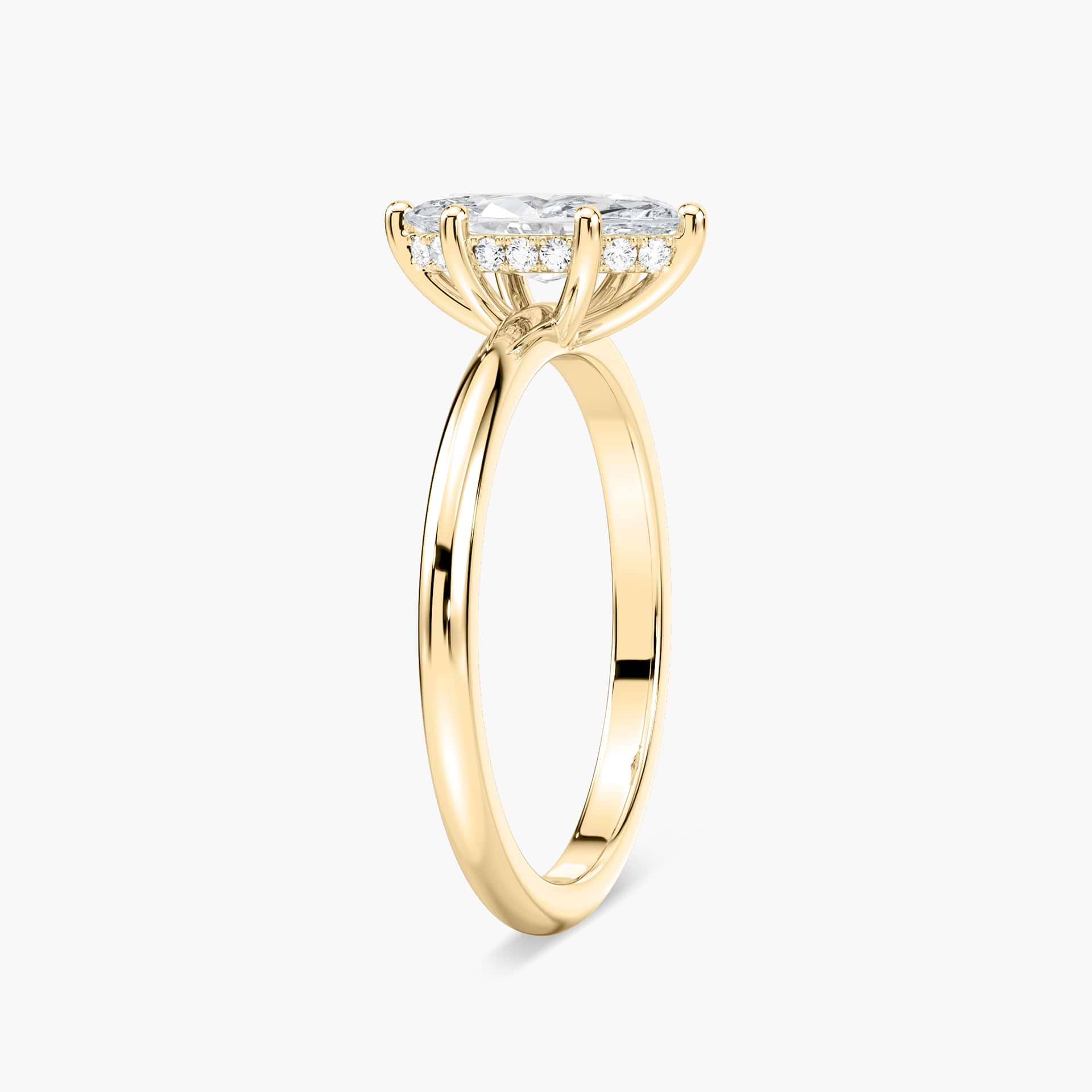 Shown with 3ct Oval Cut Lab Grown Diamond in 14k Yellow Gold|Elegant hidden halo engagement ring with 4 prong set 3ct oval cut lab grown diamond in thin 14k yellow gold band
