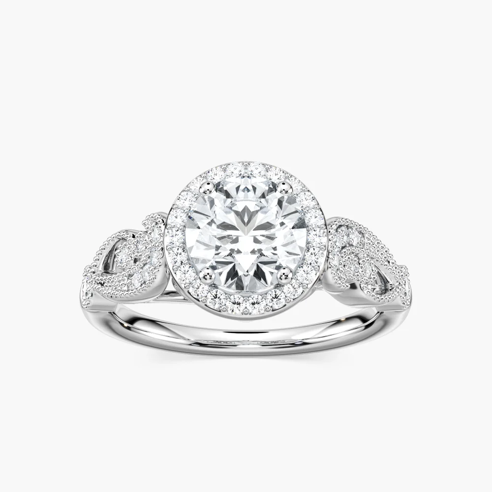 Shown with 1ct Round Cut Lab Grown Diamond in 14k White Gold|Vintage style diamond accented halo engagement ring with 1ct round cut lab created diamond with milgrain and filigree detailing in two tone 14k white gold