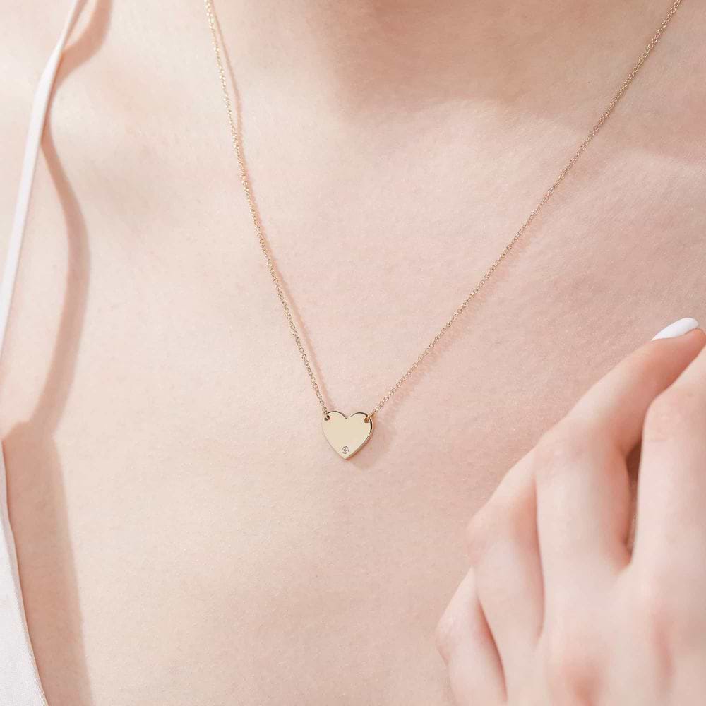 Ready-to-Ship Engravable Heart Necklace, featuring a heart pendant with an accenting 0.01ctw Lab Grown Diamond in 14K Yellow Gold on an 18inch chain.
