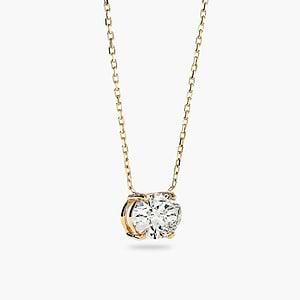 basket pendant with an oval cut lab grown diamond set in recycled yellow gold by MiaDonna