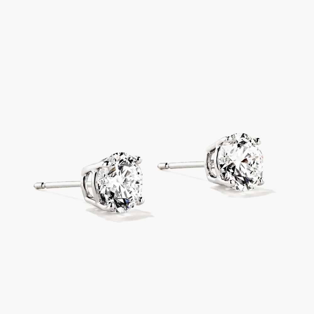 Shown in 14K White Gold|classic stud earrings featuring round cut lab grown diamonds set in white gold basket setting by MiaDonna