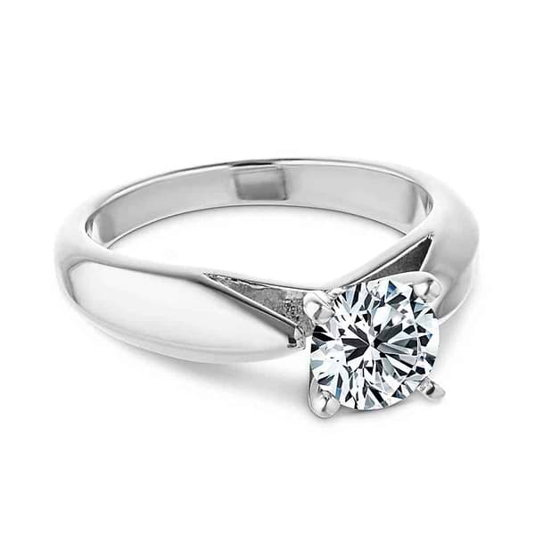 Shown with 1ct Round Cut Lab Grown Diamond in Platinum|Modern solitaire engagement ring with wide band and cathedral style design featuring 1ct round cut lab grown diamond in platinum