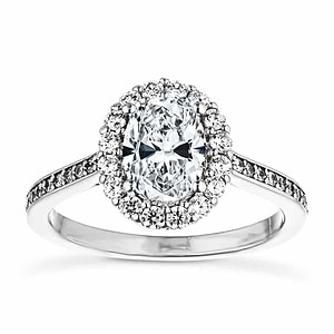 Diamond accented halo engagement ring with 1ct oval cut lab created diamond in 14k white gold setting
