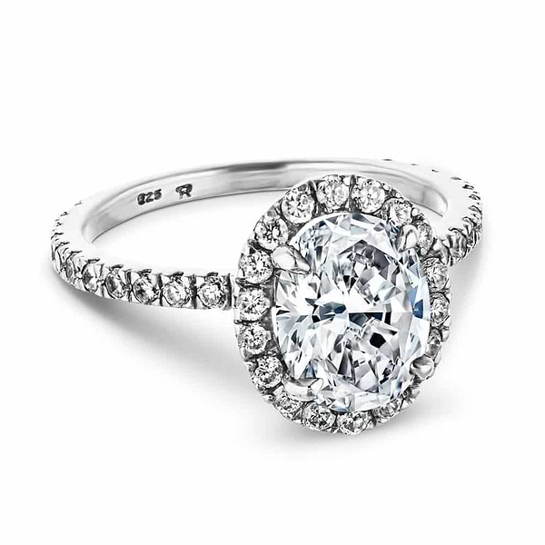 Shown with 1ct Oval Cut Lab Grown Diamond in Platinum|Dream diamond halo engagement ring with diamond accents and a 1ct oval cut lab grown diamond in platinum
