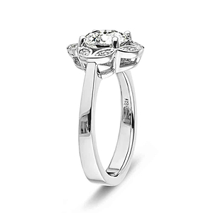 Nature inspired vintage style engagement ring with floral petal halo design around a 1ct round cut lab diamond in 14k white gold