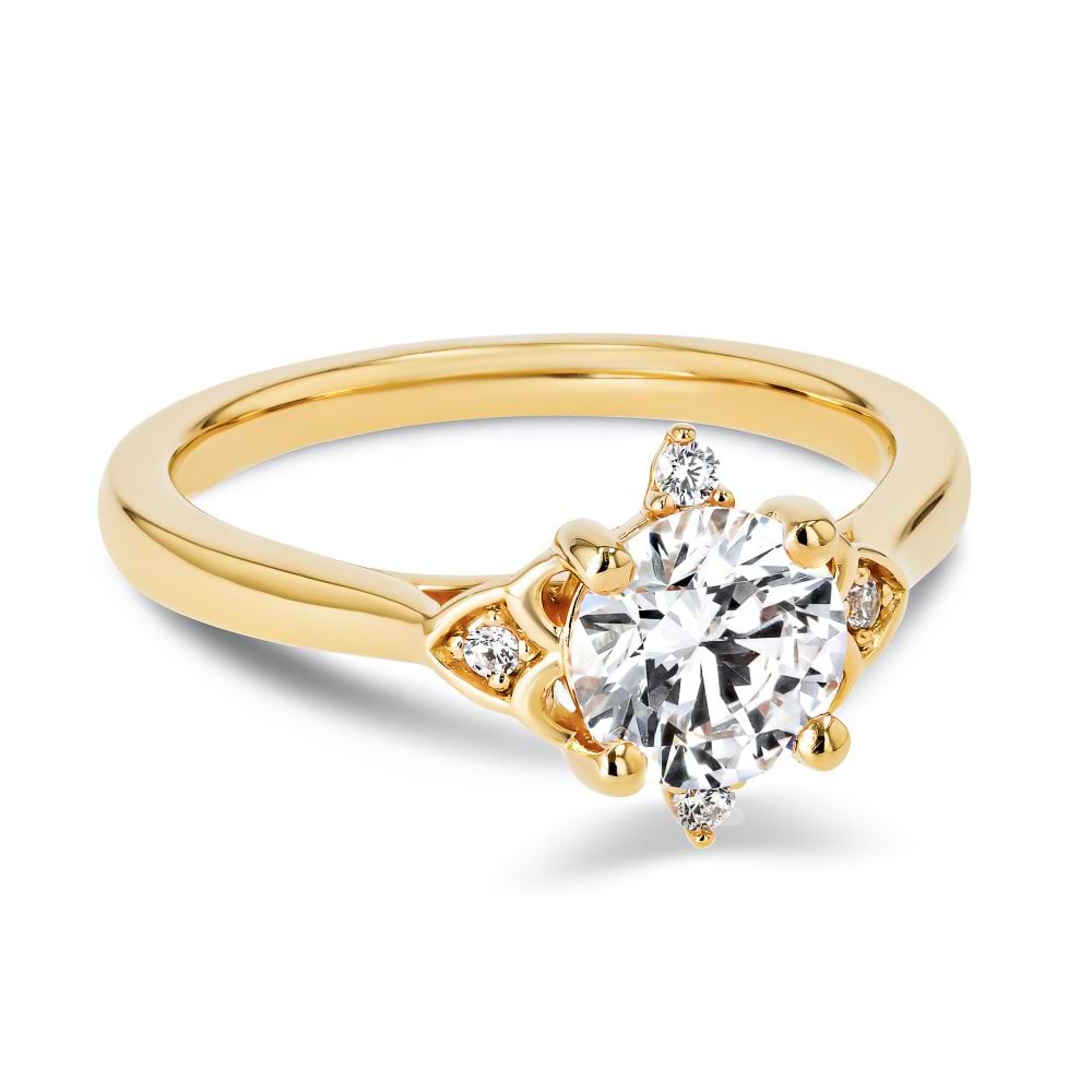 Shown here with a 1.0ct Round Cut Lab Grown Diamond center stone in 14K Yellow Gold|diamond accented engagement ring with round cut lab grown diamond center stone set in 14k yellow gold metal