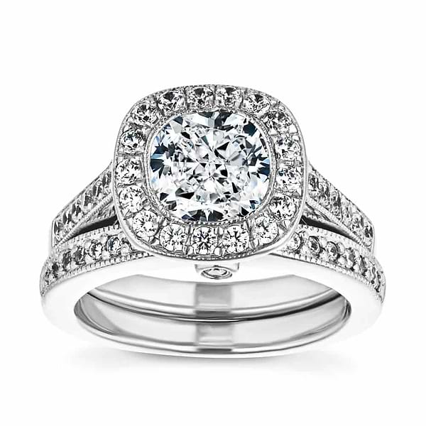 Shown with a 1.0ct Cushion cut Lab-Grown Diamond with a diamond accented and filigree detailed halo and accenting diamonds on the band in recycled 14K white gold with matching band, purchase the set together for a discount | antique vintage engagement ring Shown with a 1.0ct Cushion cut Lab-Grown Diamond with a diamond accented and filigree detailed halo and accenting diamonds on the band in recycled 14K white gold with matching wedding band