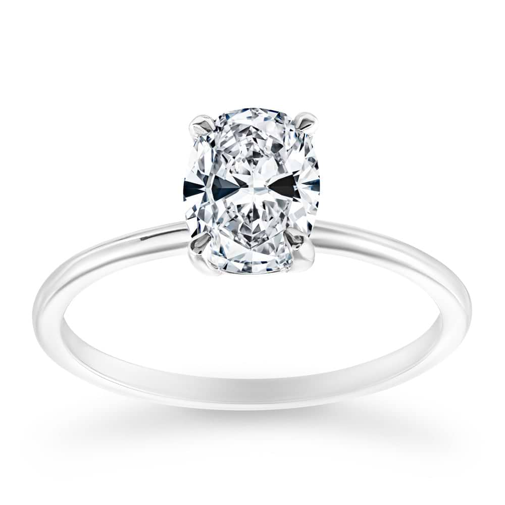 Shown with 1ct Oval Cut Lab Grown Diamond in 14k White Gold|Simple traditional solitaire engagement ring with 1ct oval cut lab grown diamond in 14k white gold band