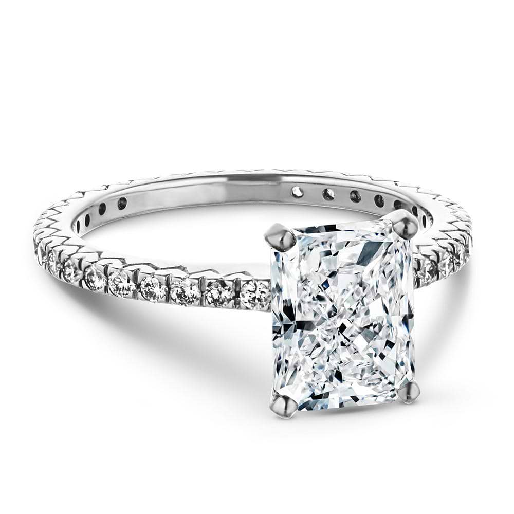 Marilyn Engagement Ring shown with a 1.0ct radiant cut Lab-Grown Diamond with recycled diamonds that go approximately 3/4 around the slightly squared band in recycled 14K white gold. Wedding band can be purchased together at a discount. | engagement ring 1.0ct radiant cut Lab-Grown Diamond recycled 14K white gold