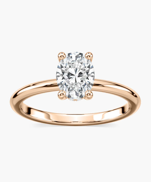 Sustainable Oval Diamond Ring with a Hidden Halo set Yellow Gold